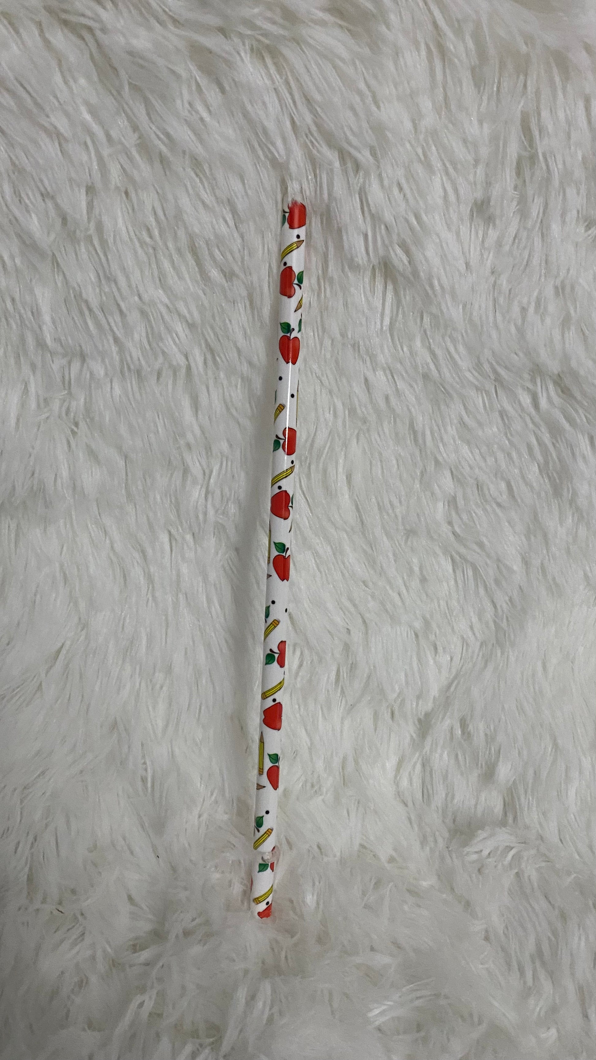 SEMI-HARD PLASTIC STRAW THAT HAS APPLES AND PENCILS TEACHER PRINT WRAPPED AROUND IT WITH STOPPER - Crazy Kat Design Co